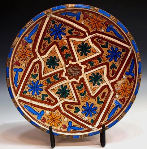 How Is Moroccan Pottery Typically Made And Designed?